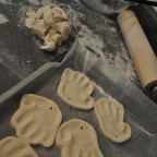 making hand print santa ornaments