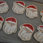 making hand print santa ornaments